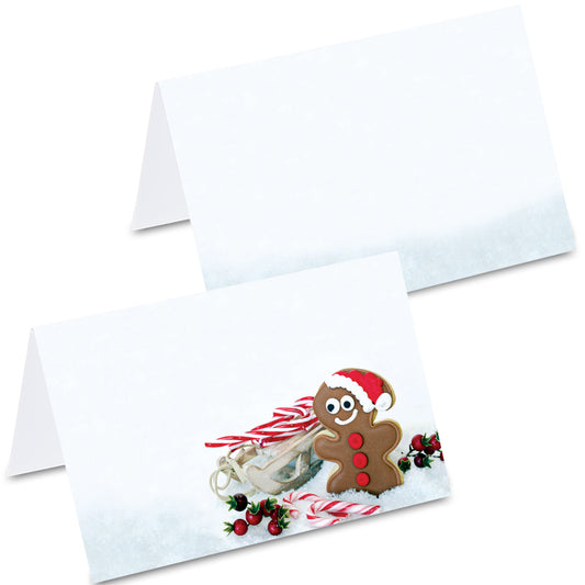 tischkarte "lebkuchen", lebkuchenmann mit schlitten und zuckerstangen im schnee auf vorderseite, rückseite mit schneemotiv