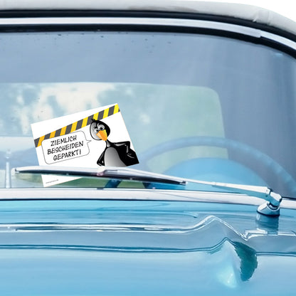flyer scheisse geparkt "pinguin" mit der aufschrift "ziemlich bescheiden geparkt" an windschutzscheibe