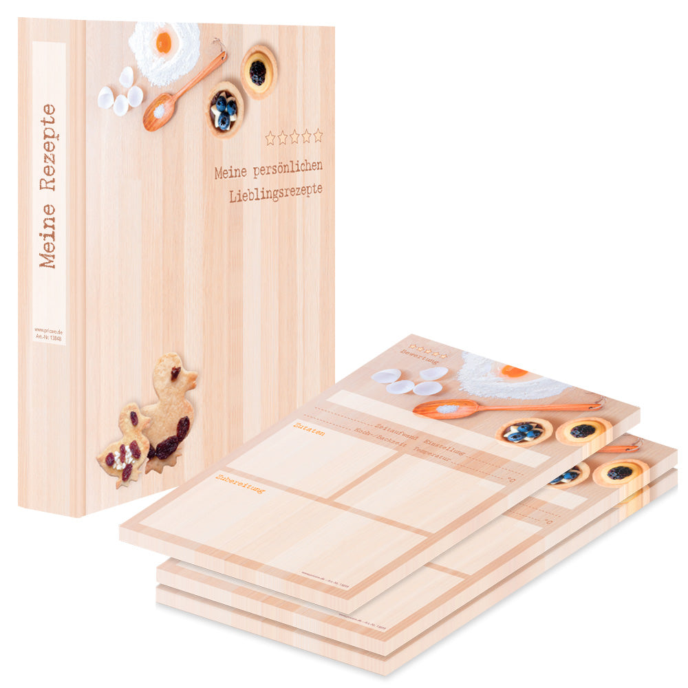 rezeptordner und rezeptblöcke backen, beige optik mit verschiedenen backzutaten, gebäck und der aufschrift meine persönlichen lieblingsrezepte, seitliche ansicht