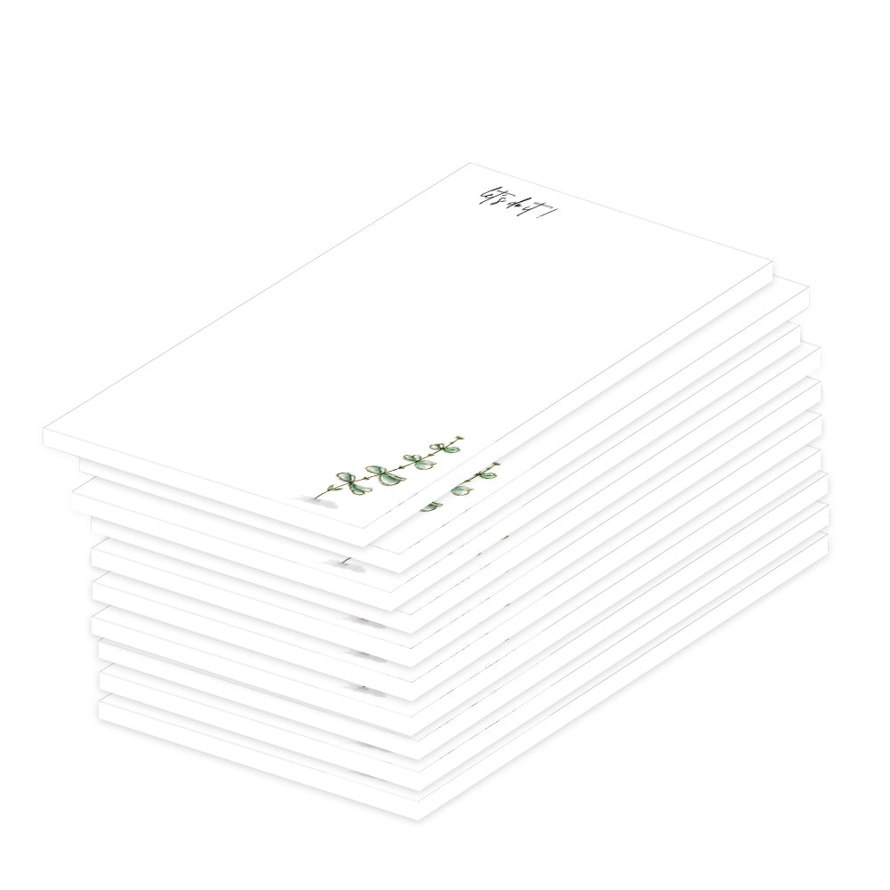 notizblock a7 eucalyptus, weiße optik mit kleinem grünen eukalyptuszweig und aufdruck let´s do it, 10er set