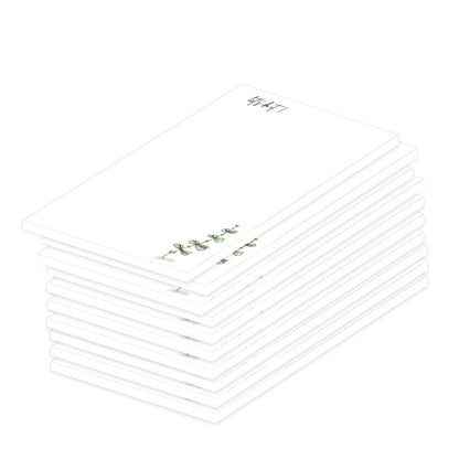 notizblock a7 eucalyptus, weiße optik mit kleinem grünen eukalyptuszweig und aufdruck let´s do it, 10er set