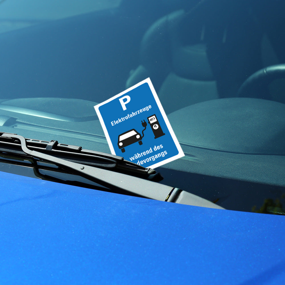 flyer scheisse geparkt "elektroauto schild" an windschutzscheibe
